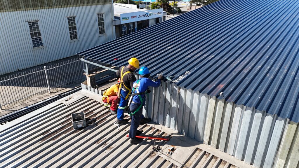 Border Roofing Team On SMA Engineering Roof